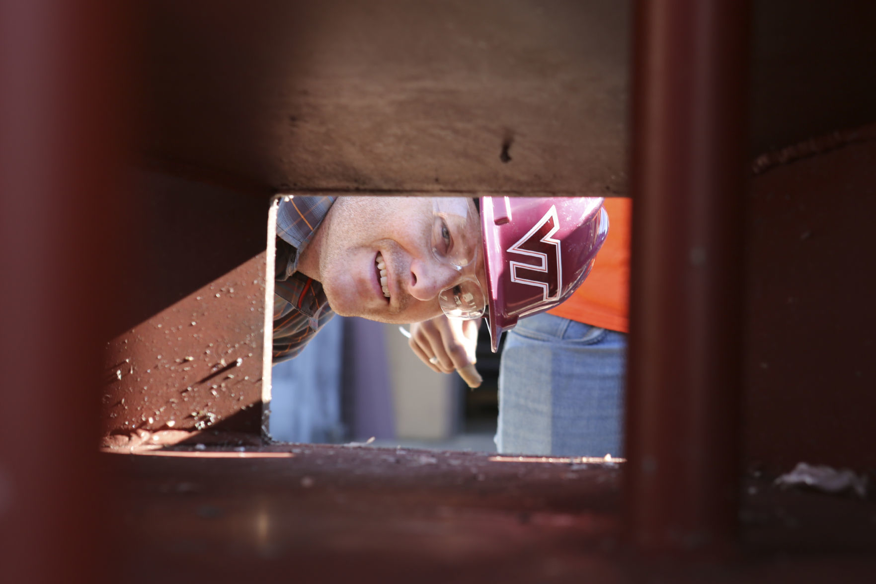 Eric Jacques looks through the firing portal of the shock tube